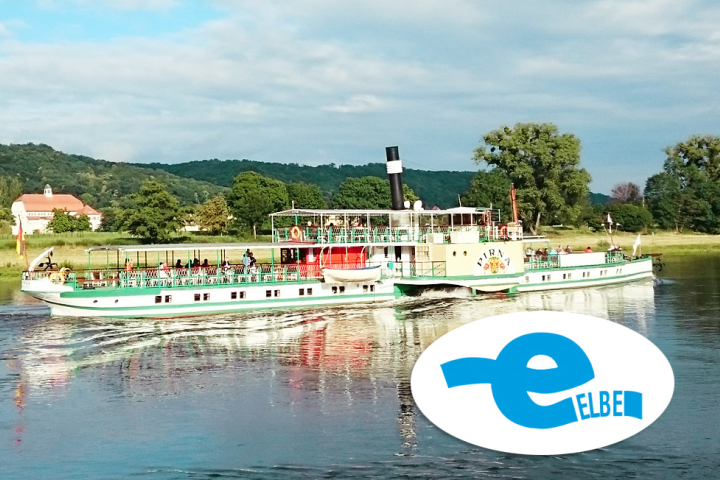 Excursion with steamboat trip on the Elbe.